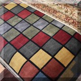 R71. Contemporary colorful checkerboard rug. 